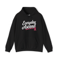 Black Everyday Ascend breast cancer awareness pullover hoodie with white script lettering, a pink ribbon, drawstring hood, and front pouch pocket.